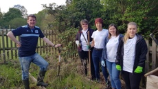 Image for Insurance Broker Gallagher Swaps Pens For Shovels At Local School