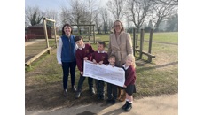 Image for Leading Leamington law firm presents bumper donation to Warwickshire school